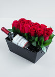Caja de rosas y vinos